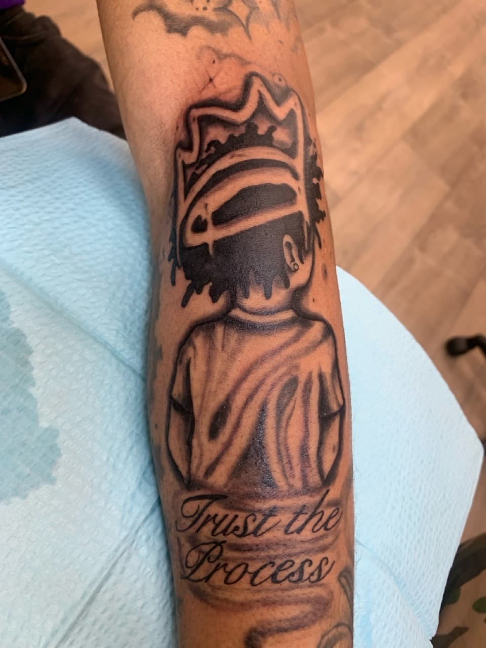Black & Grey + Lettering figure tattoo on Forearm by Modest_Ink_Ellz on TattMe