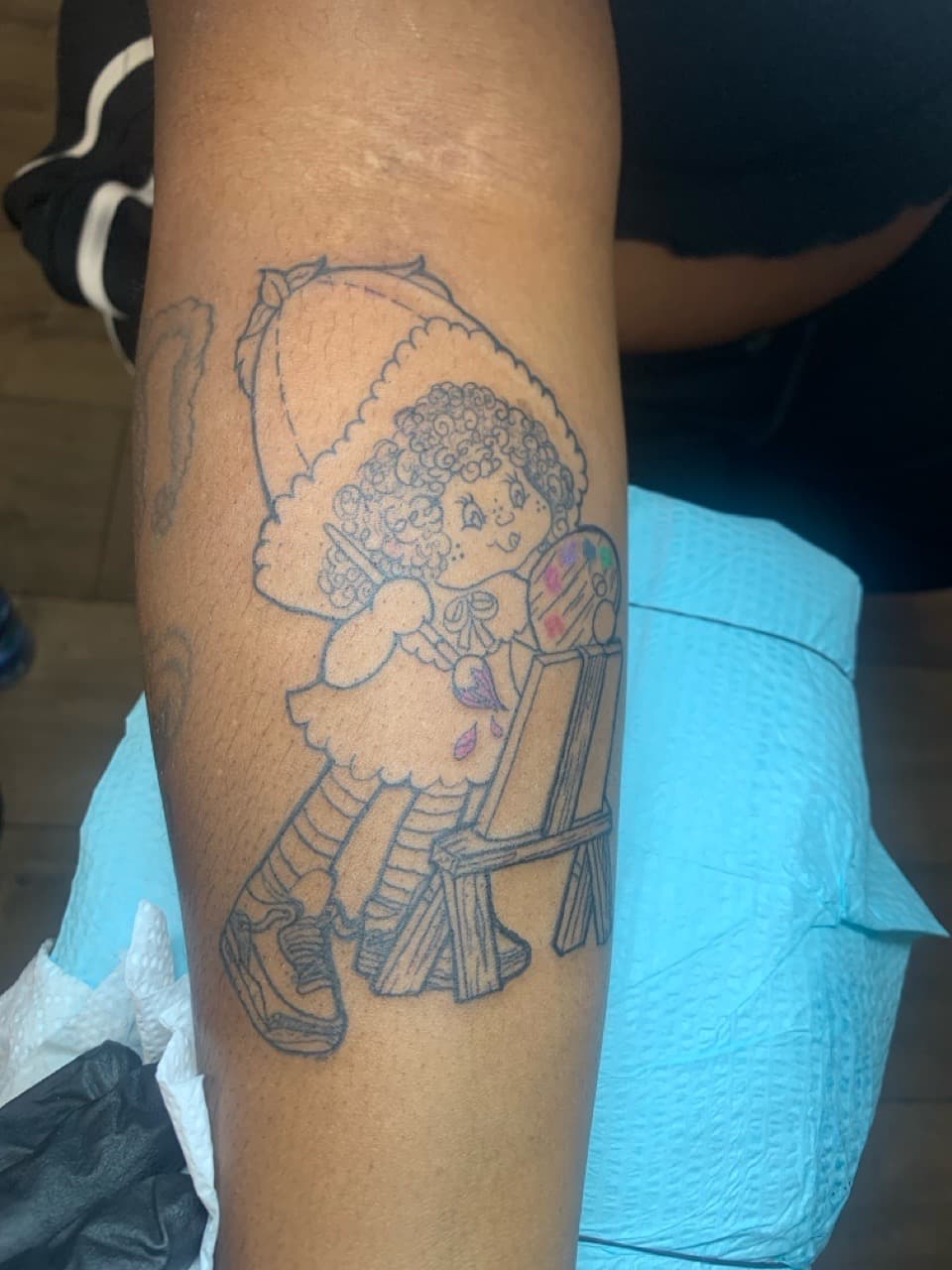 New School + Color cherub tattoo on Forearm by Modest_Ink_Ellz on TattMe