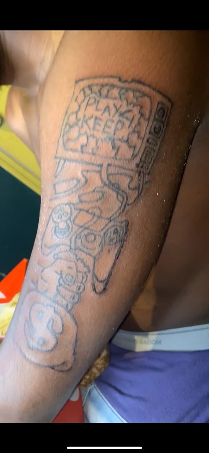 Line-work + Pop Culture video game tattoo on Upper Arm by Quis on TattMe