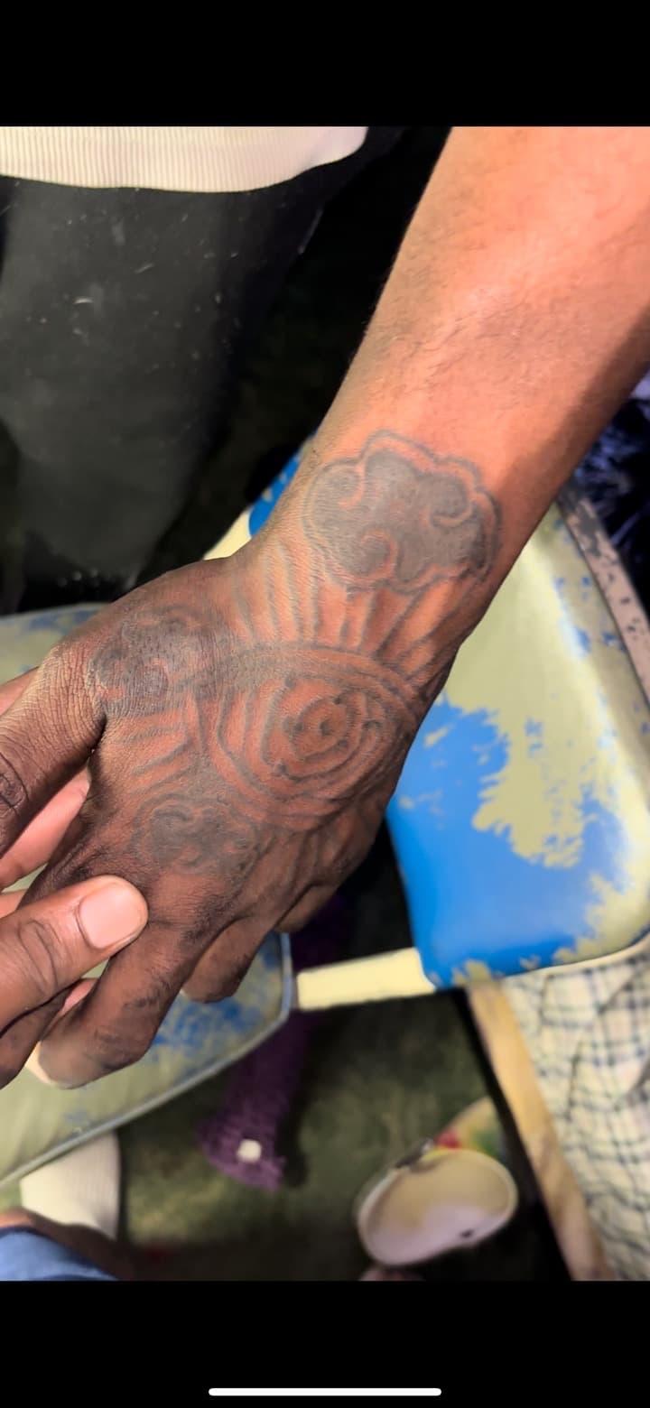 Black & Grey + Illustrative cloud tattoo on Hand by Quis on TattMe