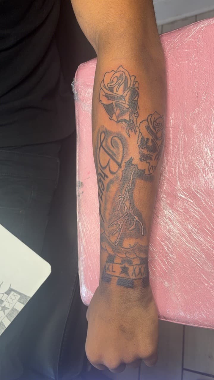 Black & Grey + Illustrative roses tattoo on Forearm by Quis on TattMe