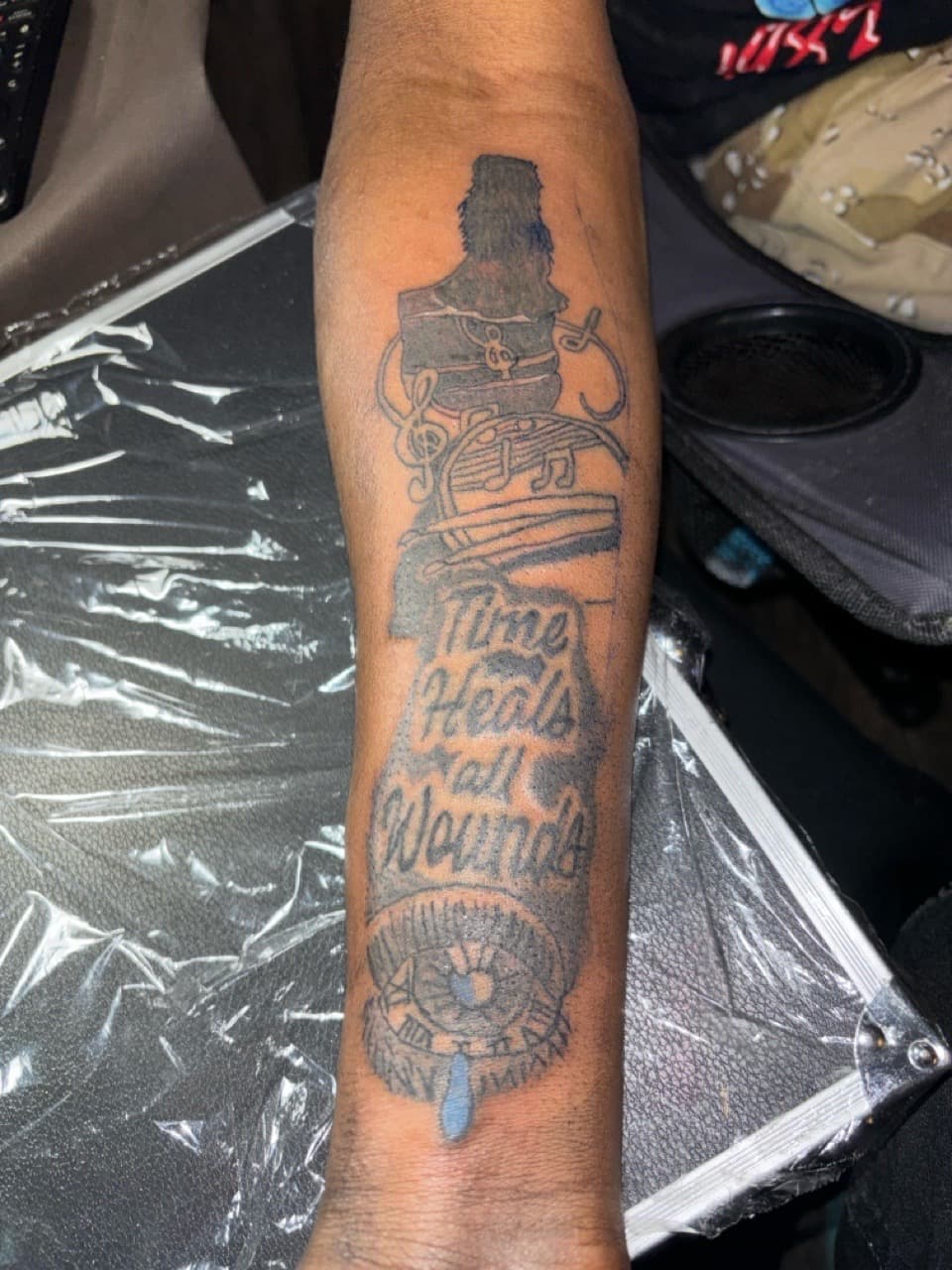 Lettering + Black & Grey music tattoo on Forearm by Quis on TattMe