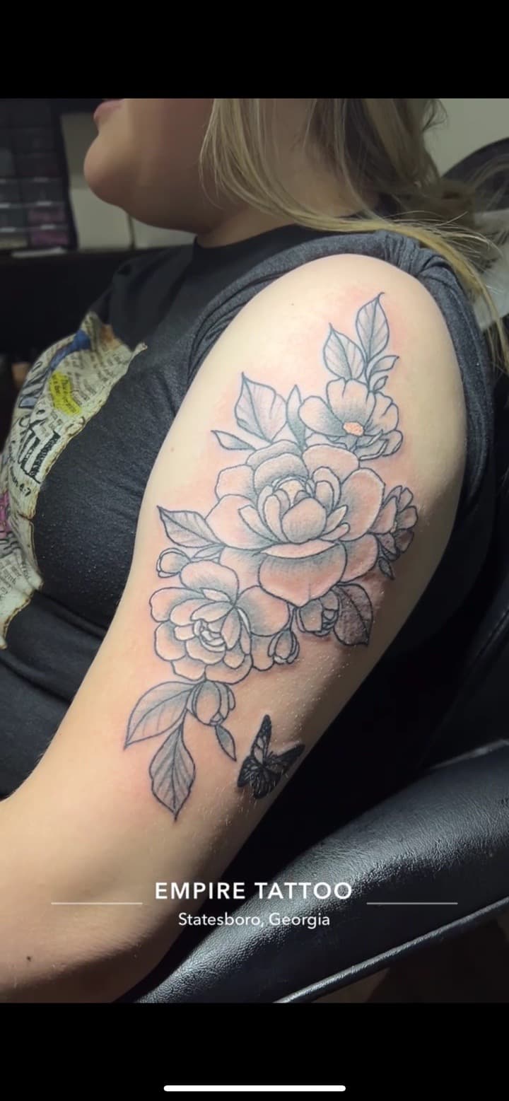 Floral + Black & Grey flowers tattoo on Upper Arm by Brianna_Martin on TattMe