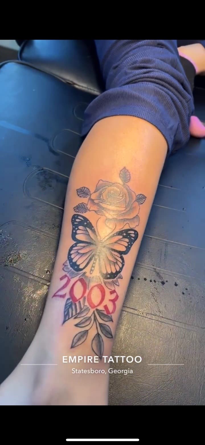 Black & Grey + Floral butterfly tattoo on Calf by Brianna_Martin on TattMe