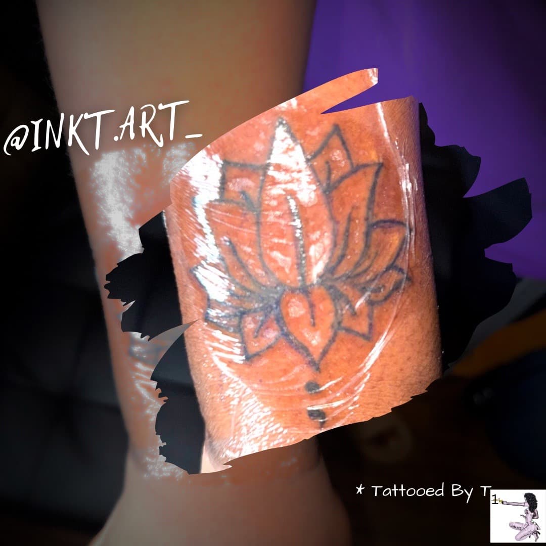 Line-work + Floral lotus tattoo on Wrist by inkT on TattMe
