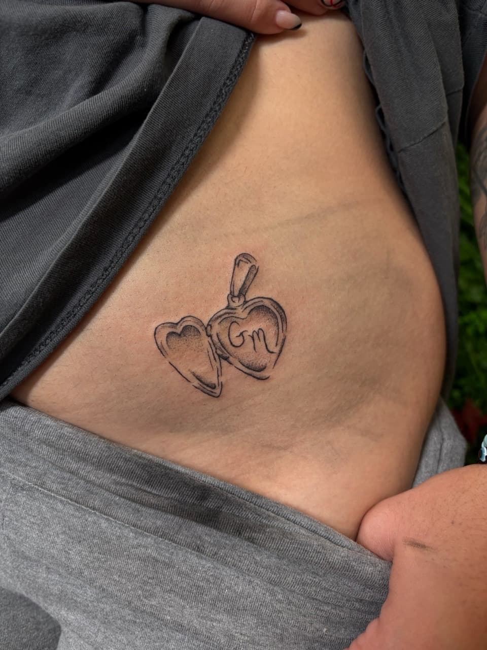 Fine Line + Black-work locket tattoo on Ribs by Jniceinkz on TattMe