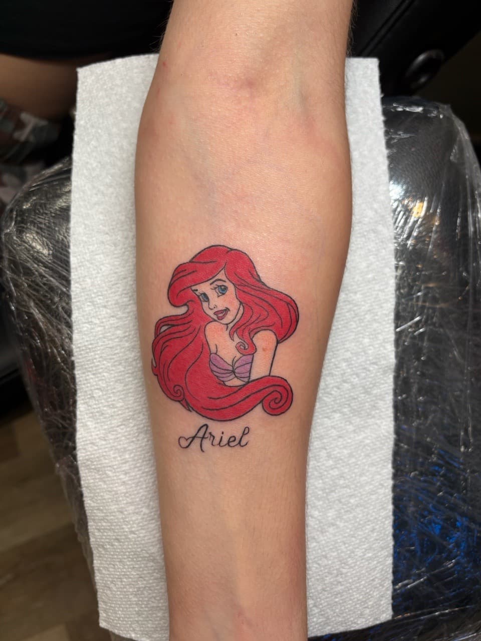 Color + Pop Culture ariel tattoo on Forearm by Jniceinkz on TattMe
