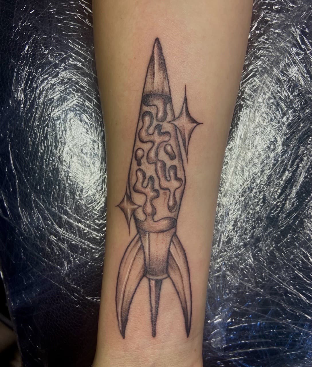 Black & Grey + Illustrative rocket tattoo on Forearm by Jniceinkz on TattMe