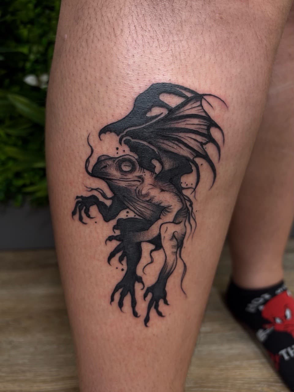 Black & Grey + Illustrative frog tattoo on Calf by Jniceinkz on TattMe