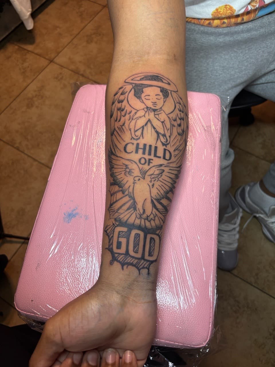 Black & Grey + Illustrative baby tattoo on Forearm by Jadance_Martin on TattMe