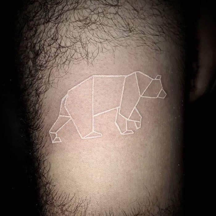 Geometric + Fine Line bear tattoo on Upper Arm by Taking_Art_2_The_Streets_1 on TattMe