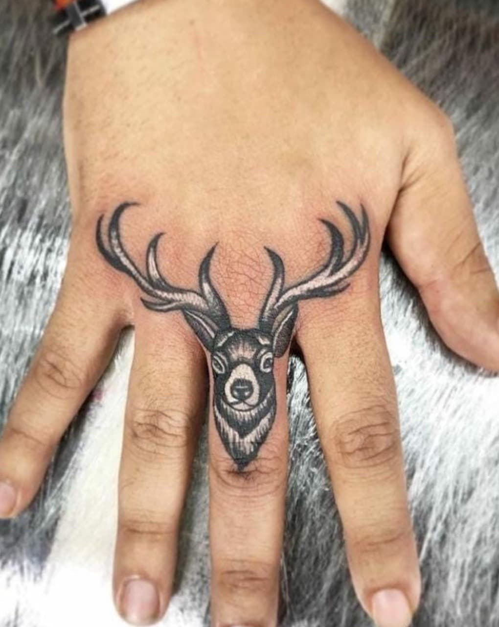 Black & Grey + Illustrative deer tattoo on Fingers by Taking_Art_2_The_Streets_1 on TattMe