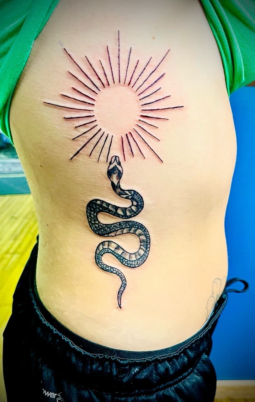 Black-work + Fine Line snake tattoo on Ribs by Taking_Art_2_The_Streets_1 on TattMe