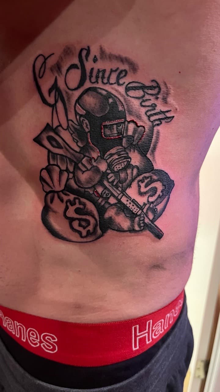 Black & Grey + Illustrative cherub tattoo on Ribs by Taking_Art_2_The_Streets_1 on TattMe