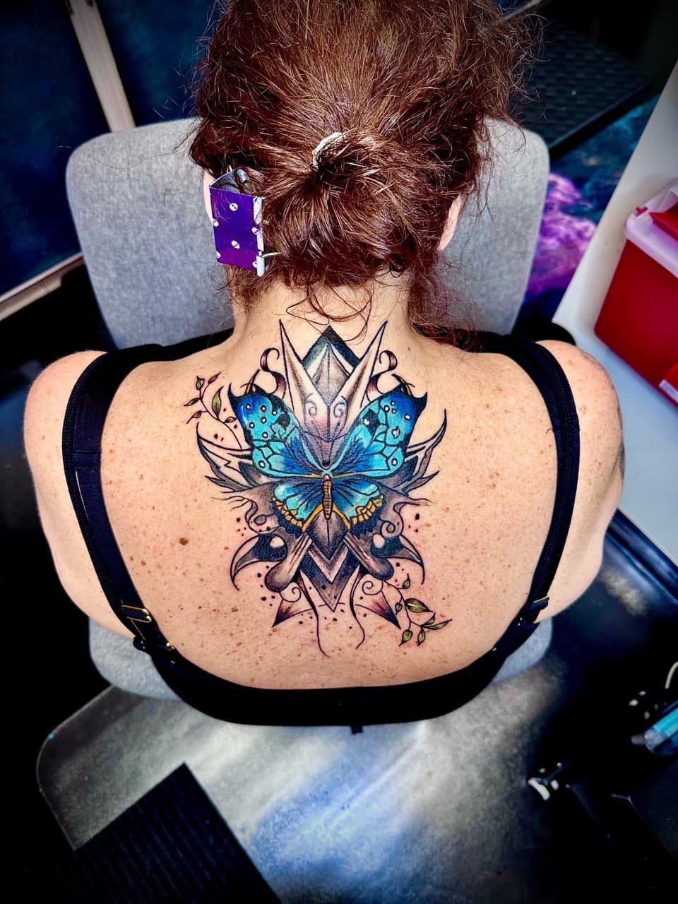 Color + Illustrative butterfly tattoo on Upper Back by Taking_Art_2_The_Streets_1 on TattMe