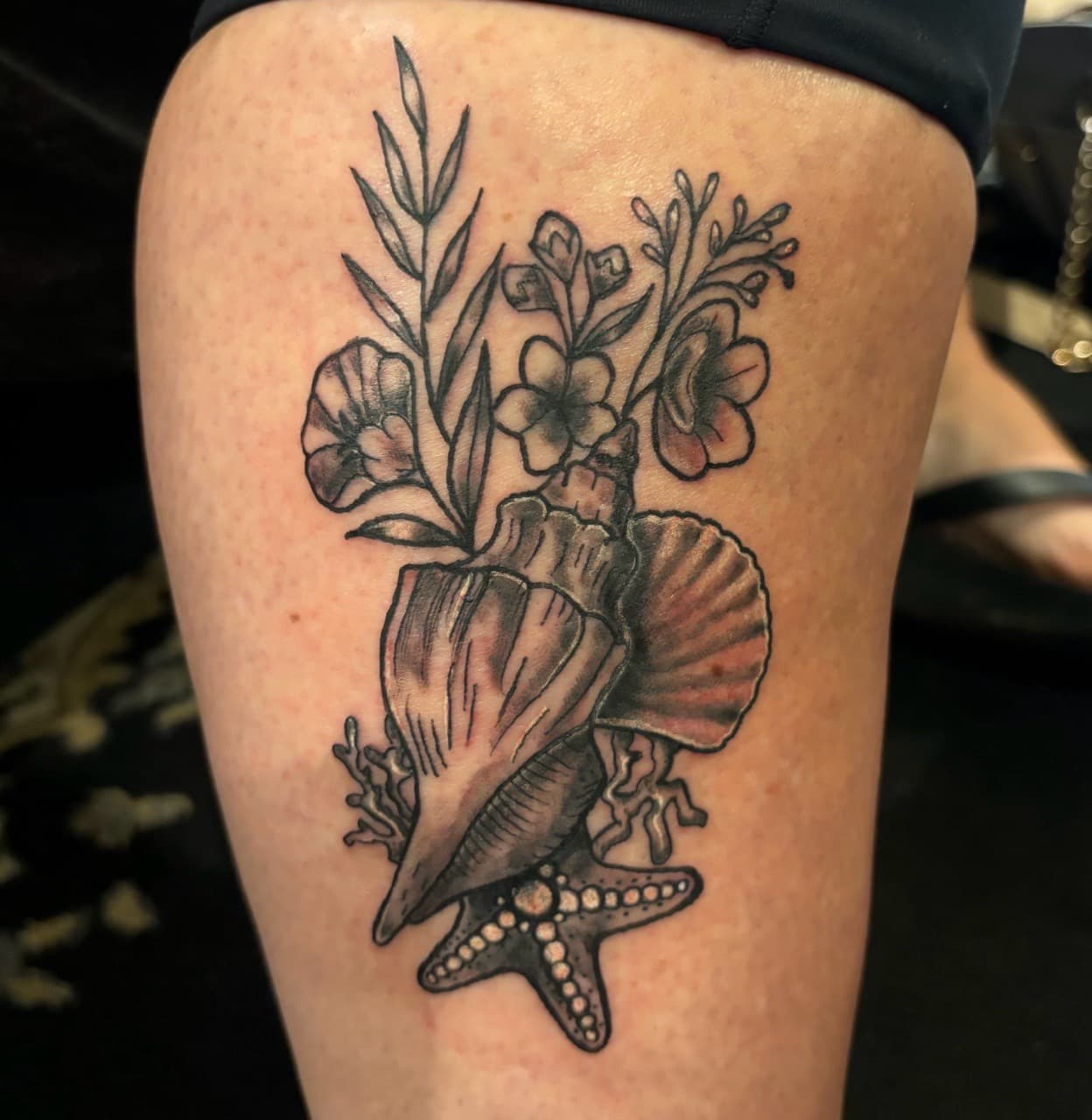 Black & Grey + Illustrative seashells tattoo on Thigh by Taking_Art_2_The_Streets_1 on TattMe