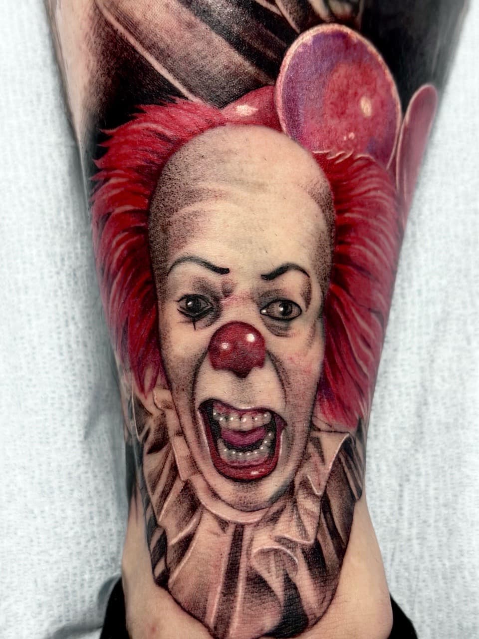 Realism + Portrait pennywise tattoo on Calf by Danny_Orellana on TattMe