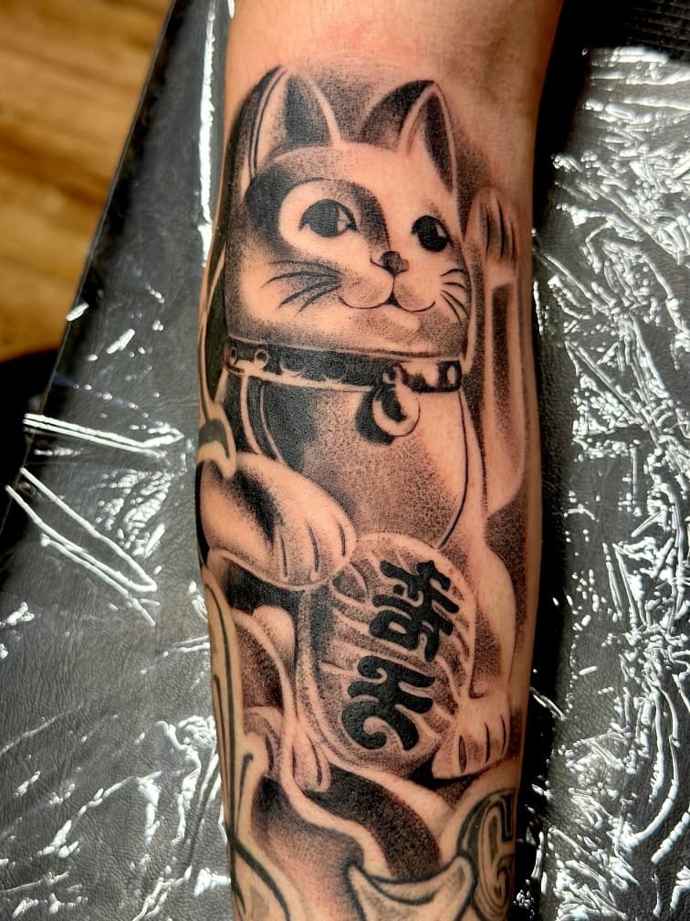 Black & Grey + Illustrative maneki-neko tattoo on Forearm by Danny_Orellana on TattMe