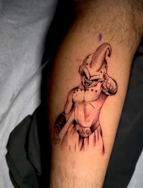 Black & Grey + Anime kid buu tattoo on Calf by SalinasTatto on TattMe