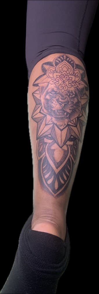 Black & Grey + Black-work lion tattoo on Calf by Blessed_Ink_Therapy on TattMe