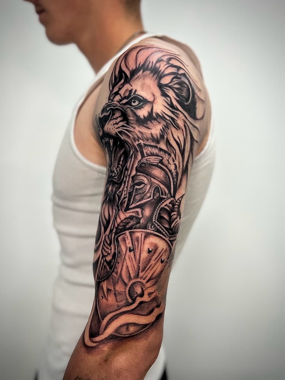 Black & Grey + Realism lion tattoo on Half Sleeve by KG_PURE on TattMe