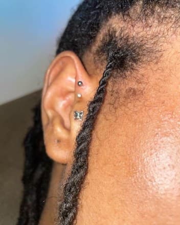 ear tattoo on Face by Princessyz_Ink on TattMe