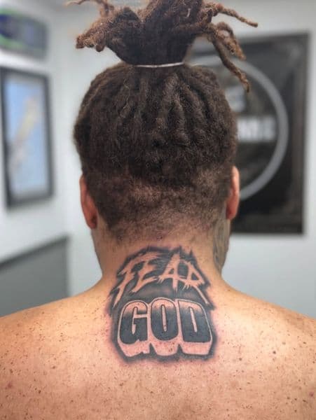 Lettering + Black & Grey fear tattoo on Neck (Back) by Wraithtattoos on TattMe