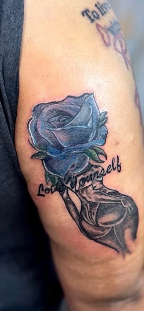 Color + Floral blue rose tattoo on Upper Arm by Kingslayer_Tattoo_Parlor on TattMe