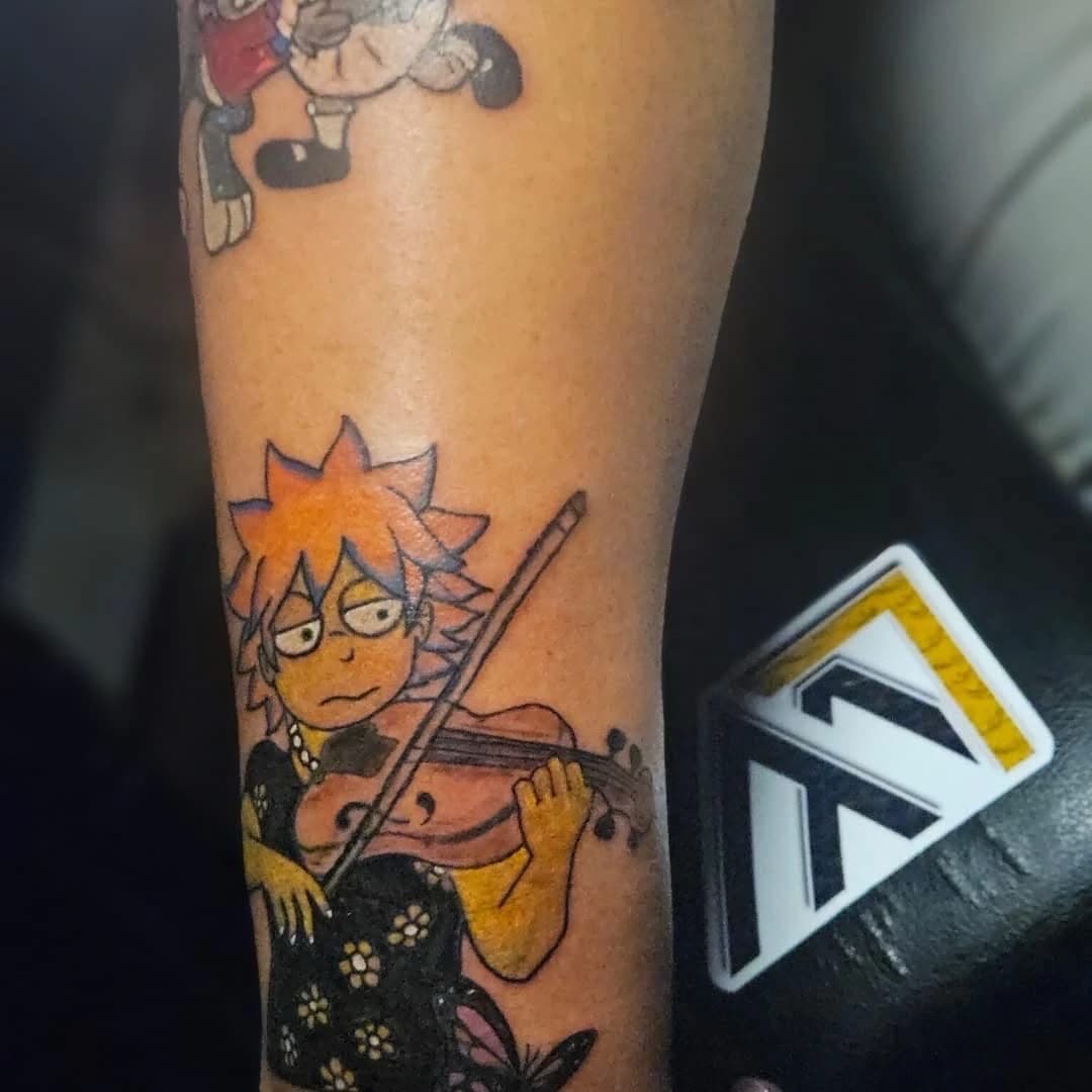 Cartoon + Color violin tattoo on Forearm by Kingslayer_Tattoo_Parlor on TattMe