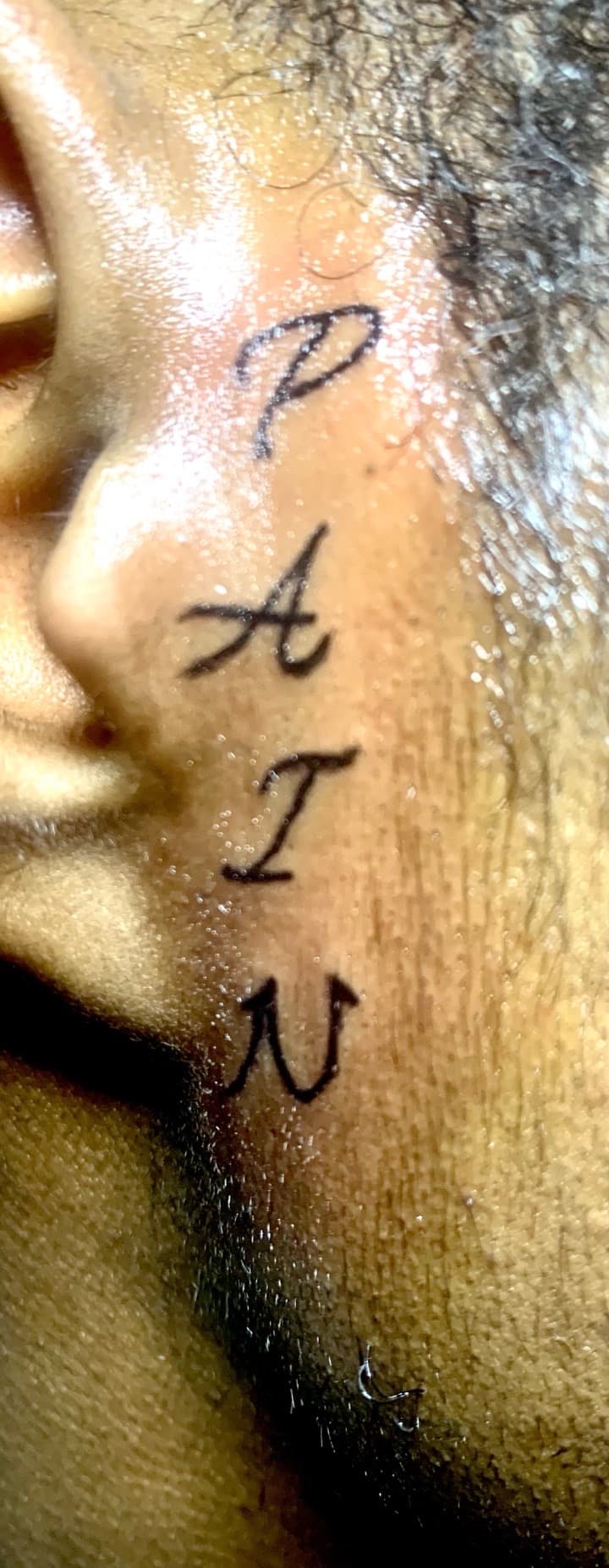 Lettering + Script word tattoo on Face by Kaapt3ntattoos on TattMe