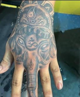 Black & Grey + Illustrative elephant tattoo on Hand by LV on TattMe