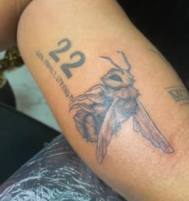Black & Grey + Illustrative bee tattoo on Upper Arm by LV on TattMe