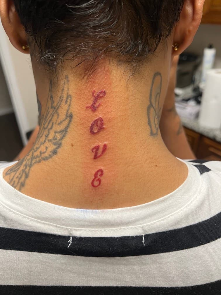 Lettering + Script love tattoo on Neck (Back) by LV on TattMe