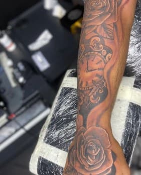 Black & Grey + Illustrative roses tattoo on Forearm by LV on TattMe