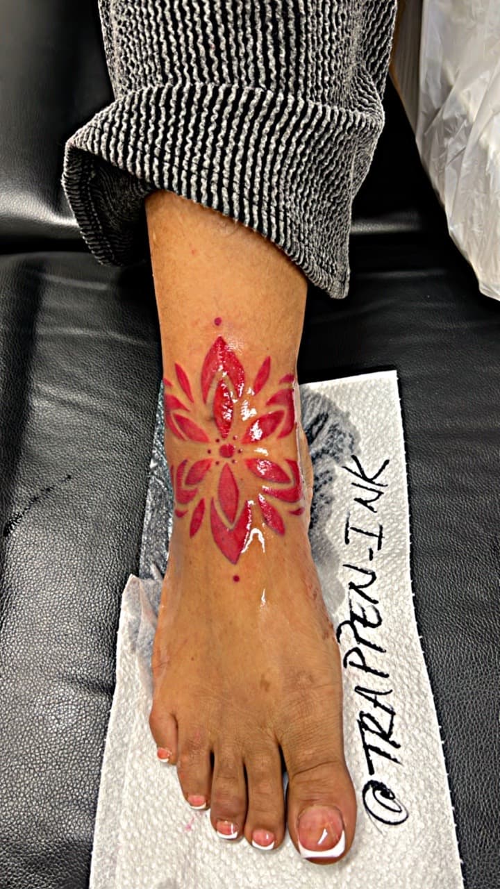 Floral + Geometric flower tattoo on Foot by LV on TattMe