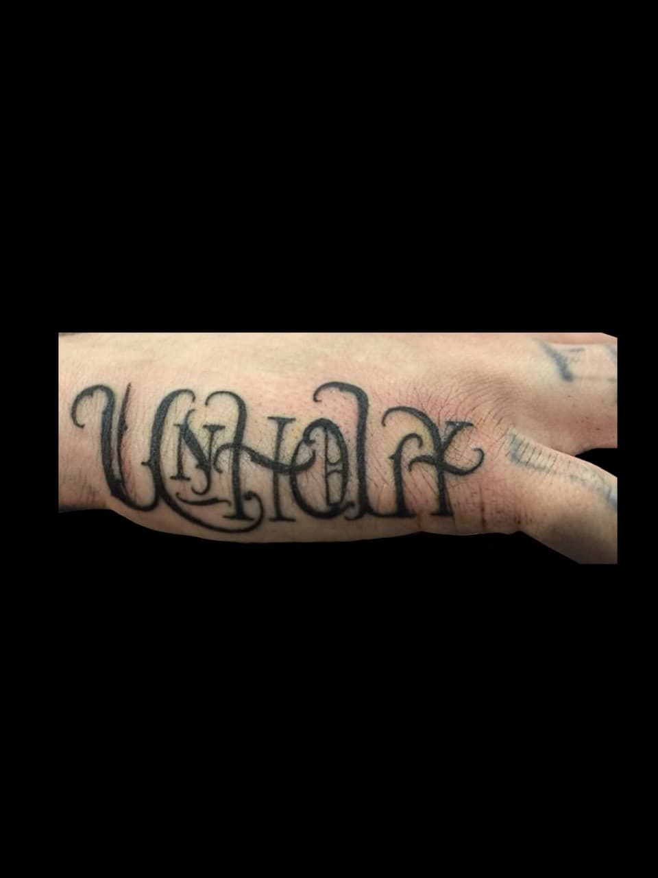 Lettering + Script unholy tattoo on Hand by all_saints_social on TattMe