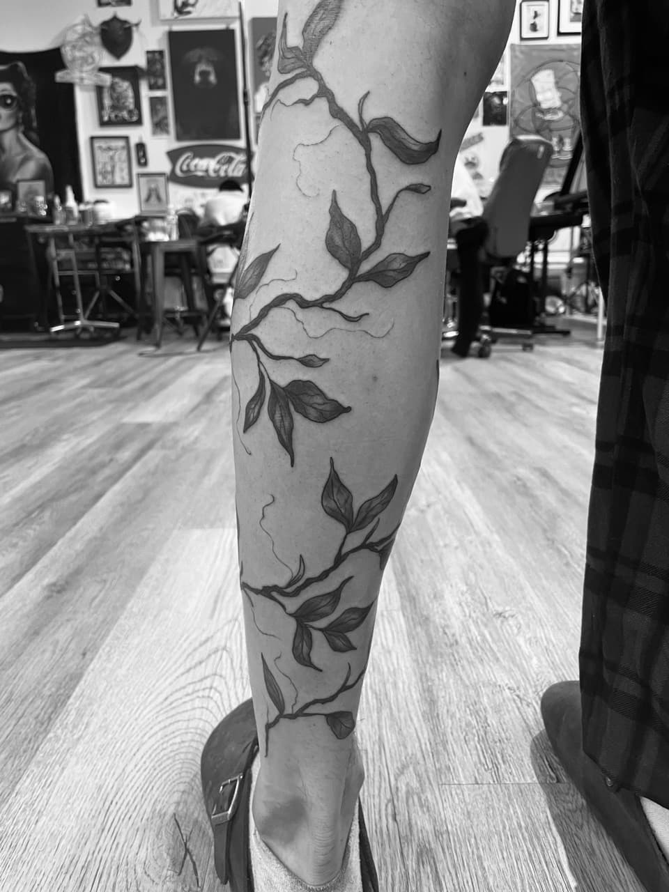 Fine Line + Black & Grey vines tattoo on Calf by all_saints_social on TattMe