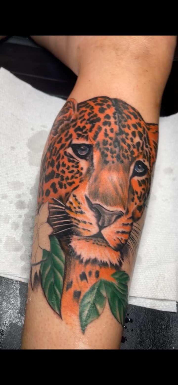 Realism + Color leopard tattoo on Calf by MauryTatz on TattMe
