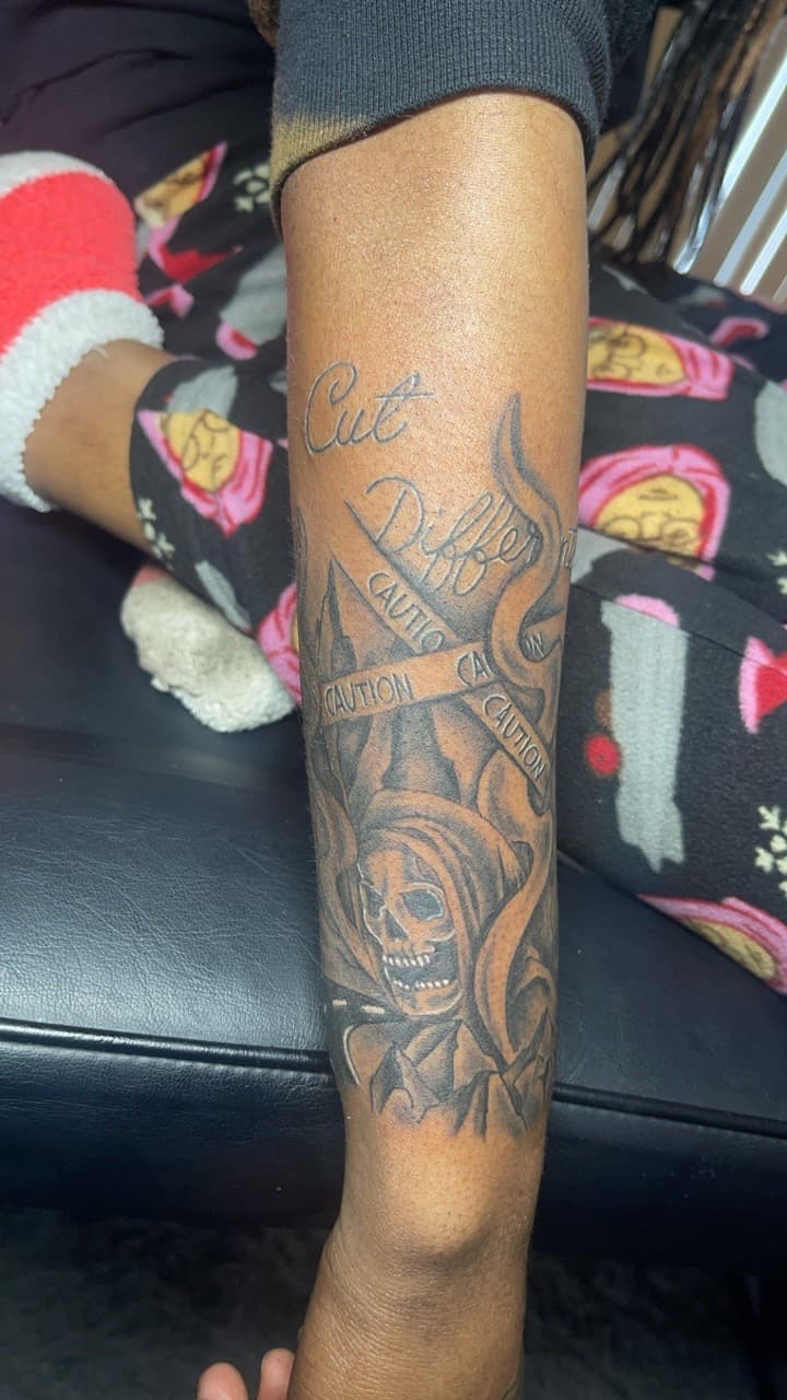 Black & Grey + Lettering skull tattoo on Forearm by MauryTatz on TattMe