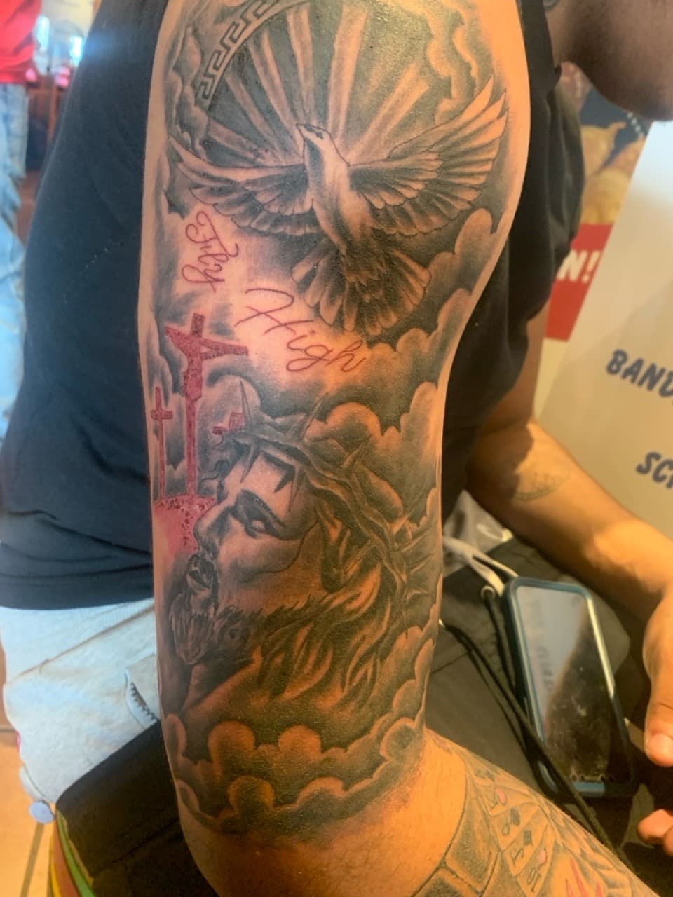 Black & Grey + Religious jesus tattoo on Upper Arm by MauryTatz on TattMe