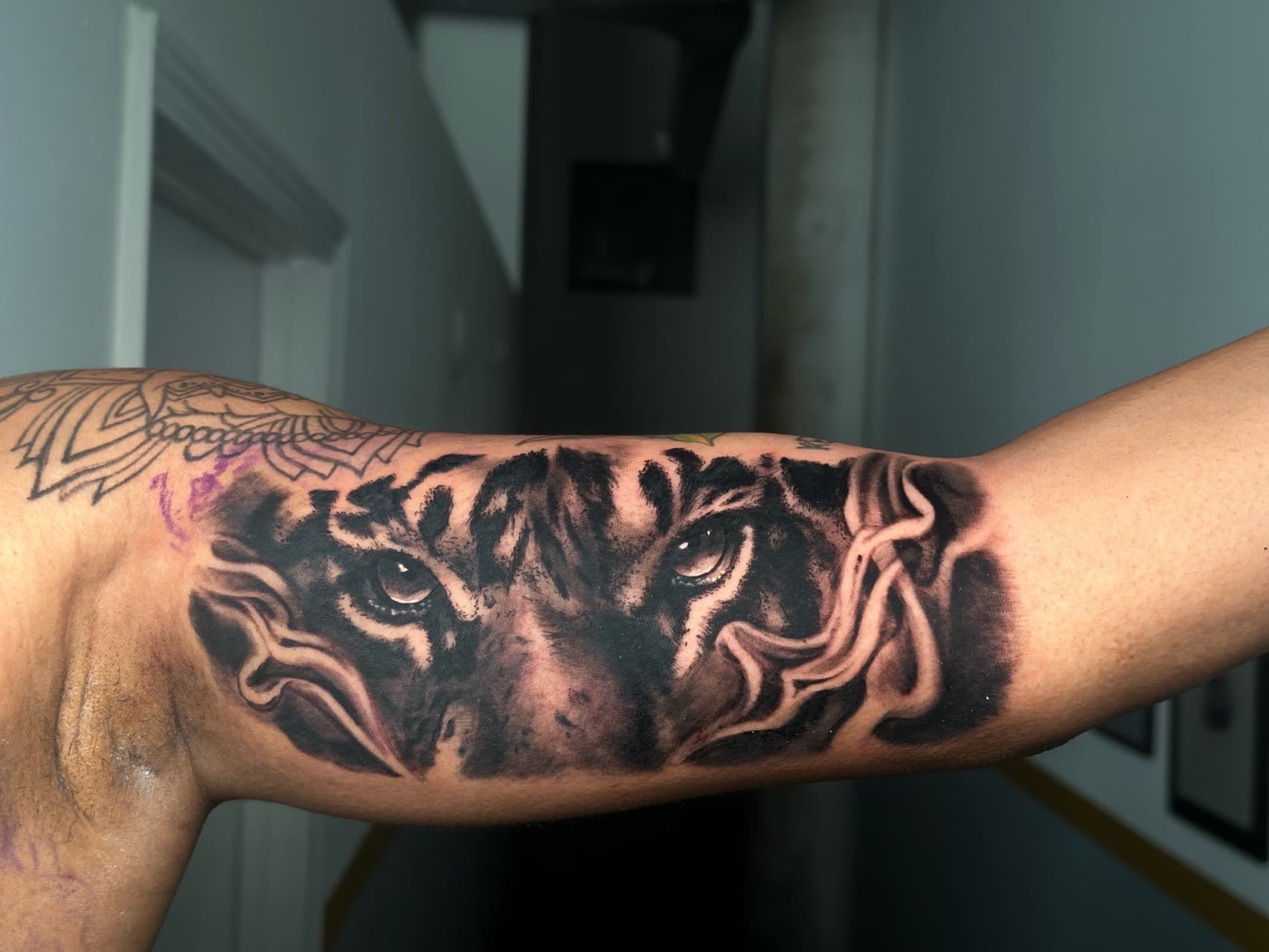Realism + Black & Grey tiger tattoo on Upper Arm by J.R._Outlaw on TattMe