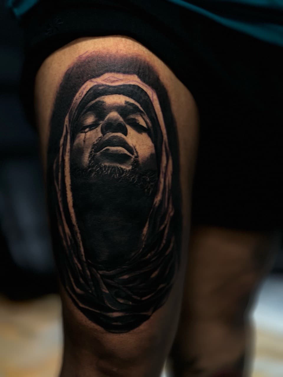 Realism + Black & Grey man tattoo on Thigh by J.R._Outlaw on TattMe