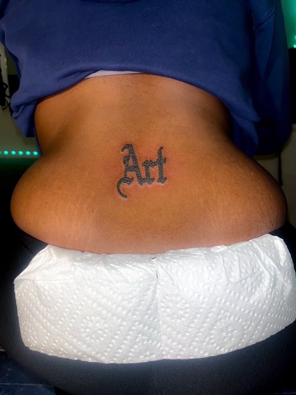 Lettering + Gothic word tattoo on Lower Back by staylitink on TattMe