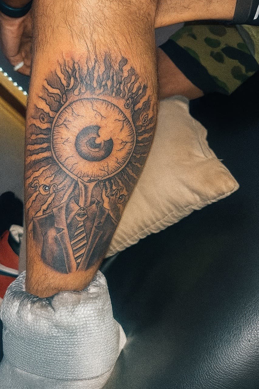Black & Grey + Surrealism eye tattoo on Calf by staylitink on TattMe