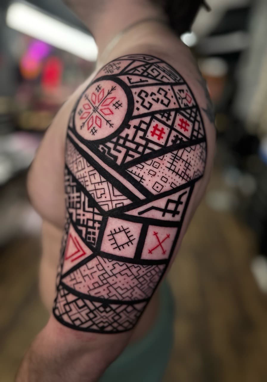 Geometric + Black-work geometric patterns tattoo on Upper Arm by Cael_Tattoos on TattMe