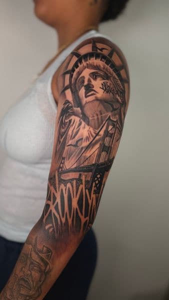 Black & Grey + Realism statue of liberty tattoo on Full Sleeve by Randy_SVGE on TattMe