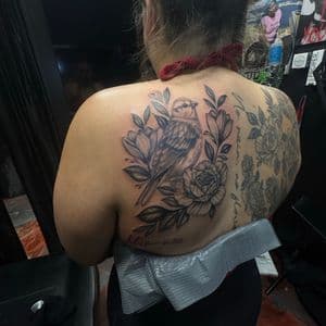 Black & Grey + Floral Bird tattoo on Upper Back by Ink_Junkie on TattMe