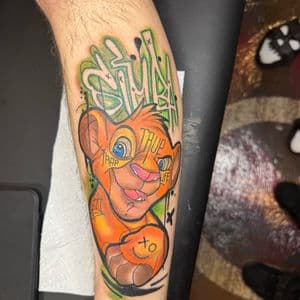 Color + Graffiti simba tattoo on Calf by Ink_Junkie on TattMe