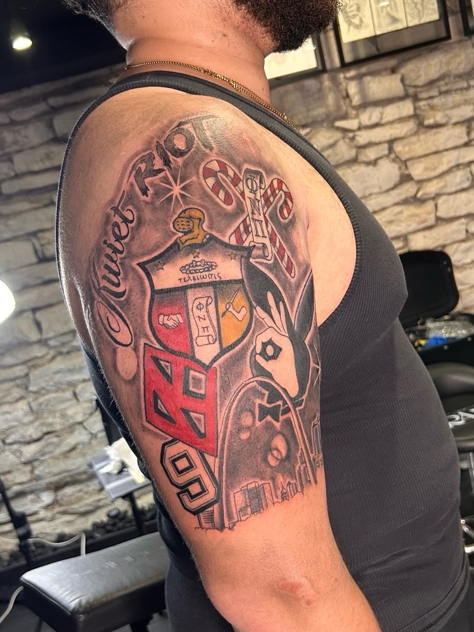 Lettering + Traditional fraternity crest tattoo on Upper Arm by xRay_The_Artist on TattMe