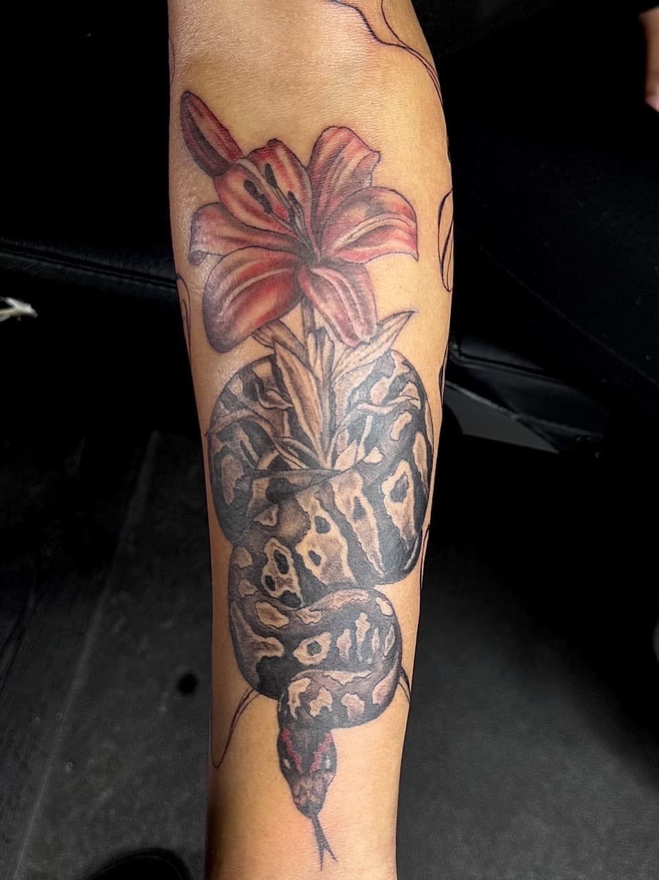 Illustrative + Floral snake tattoo on Forearm by xRay_The_Artist on TattMe